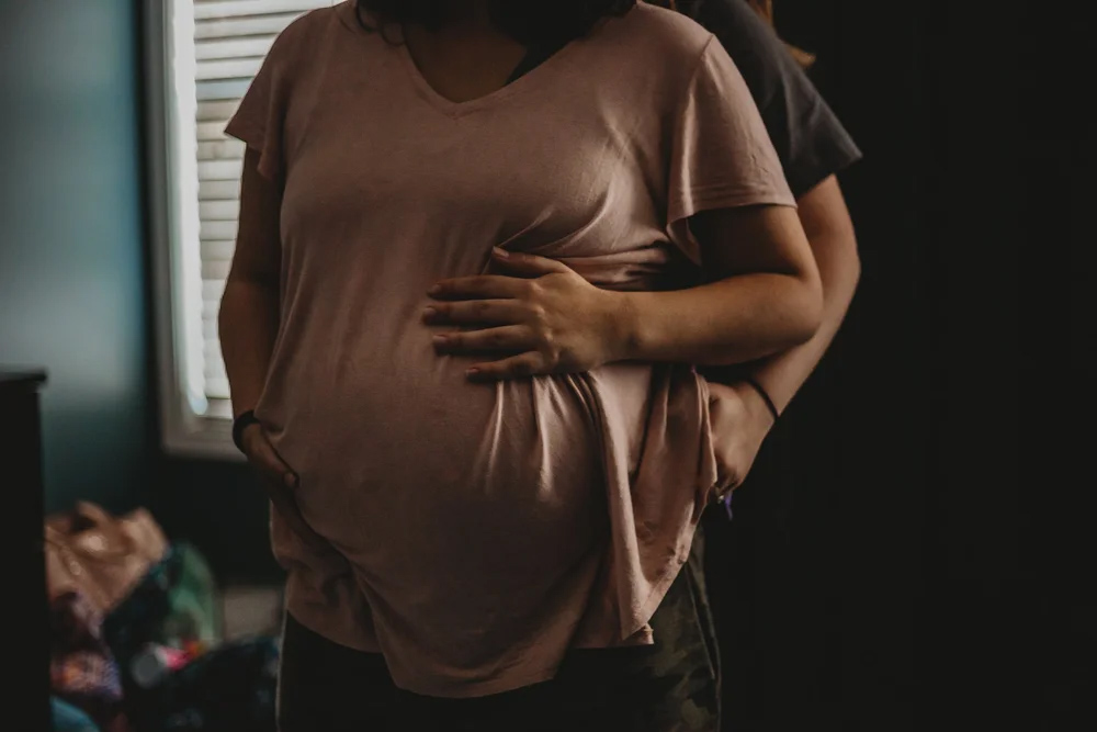 An expectant parent preparing for birth